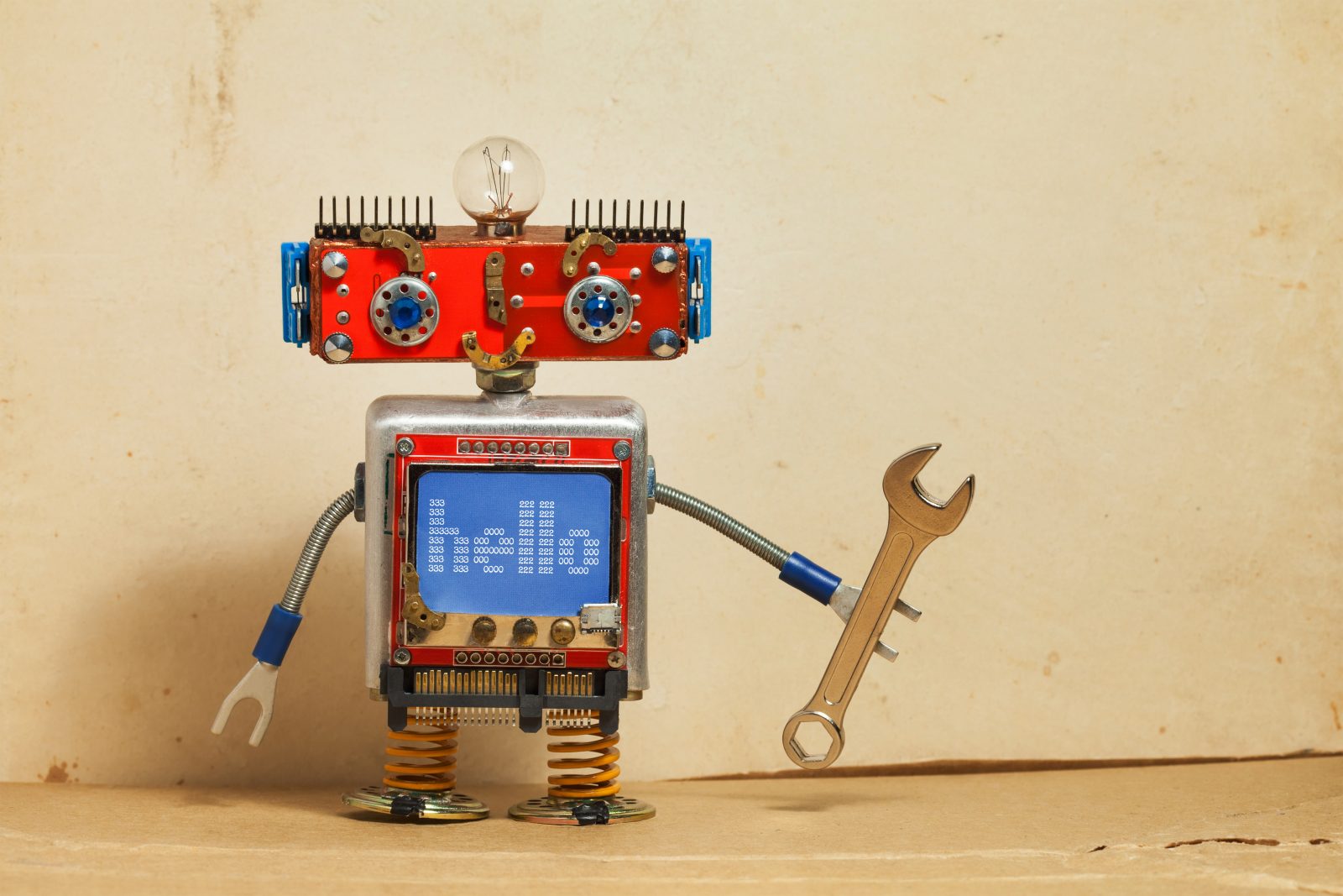 Steampunk machinery robot, smiley red head, blue monitor body. Handyman electrician retro toy, message hello display computer screen, hand wrench. Service repair fix concept. Vintage paper backdrop