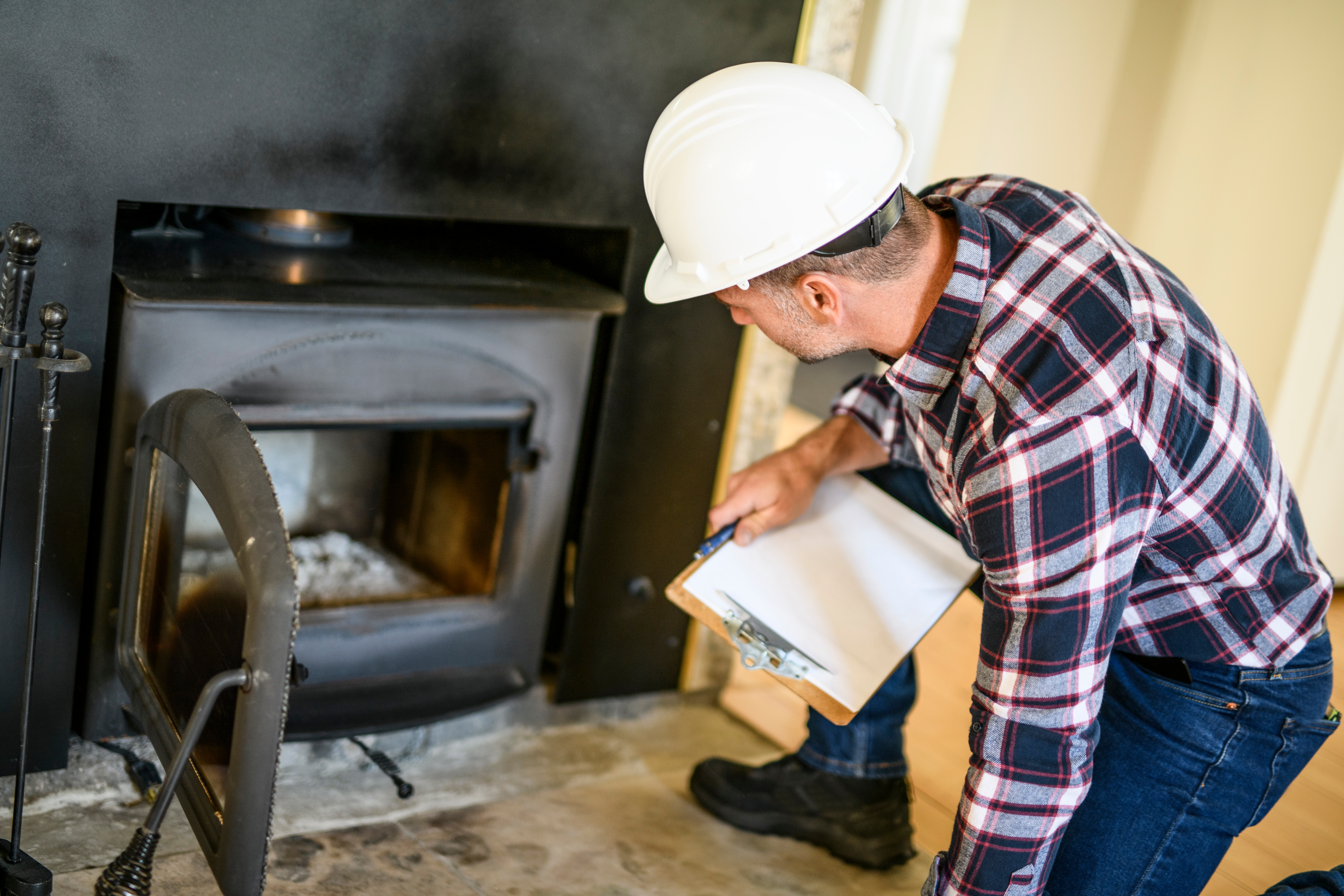 Inspector inspecting an old house to be sure everything is well build