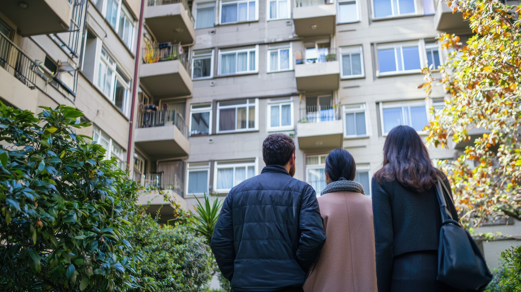 A couple viewing an apartment for rent with a realtor.
